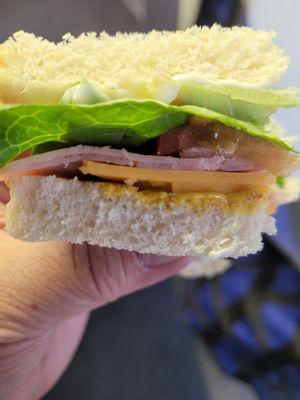 A sad ham and cheese deli sandwich for $13!!!  Avoid this place!