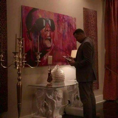 Terrance Howard on SET OF EMPIRE in front Gary with Da Tea Painting.