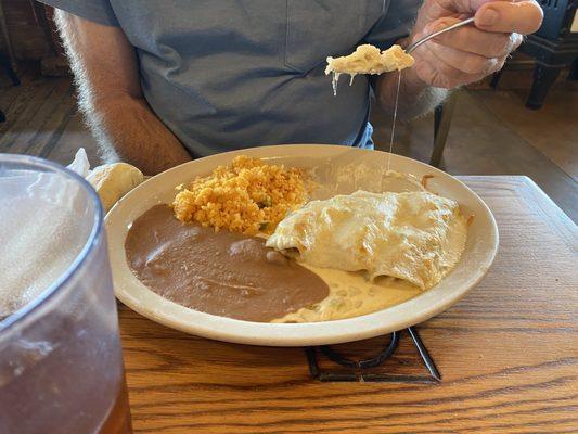 Chicken Enchiladas with sour cream sauce platter.