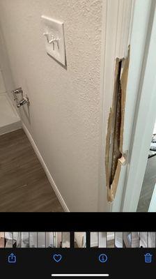 Master bathroom door damages. The paint is all Ayer based, baseboard paint peels off like a sticker.