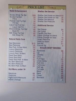 Price list hanging on the wall.