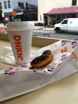 Nothing like a cup of hot chocolate And a chocolate frosted doughnut (don't forgets the sprinkles) On a nice autumn day