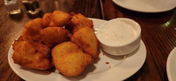 The caramelized onion tater tots with horseradish cream