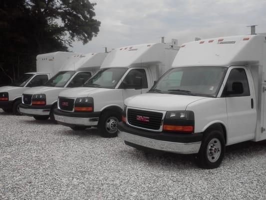 Savana vans with boxes.