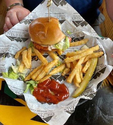 Buffalo Crispy Chicken on Brioche with seasoned French Fries.  My husband loved it!