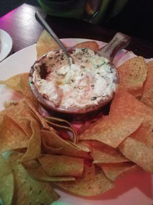 Artichoke dip? I have never seen a dip like this. Not sure what is it. Too thick and 2 huge pieces of artichoke does not make this a dip.