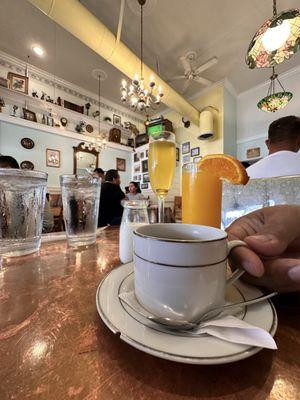 Awesome coffee with cup and chipped saucer just like at grandmas. Oh, and the grown-up mimosa.