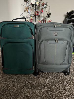 My old carry on, dark green. And the new carry on, olive color