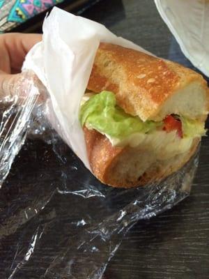 Brie, lettuce, roasted pepper, and mustard on a Demi baguette. Sandwich is delish, but it's $5.30 for a half! insane prices