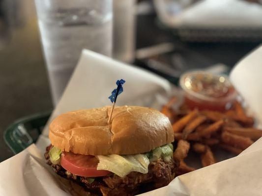 Crispy chicken sandwich cilantro jalapeño style with sweet potato fries