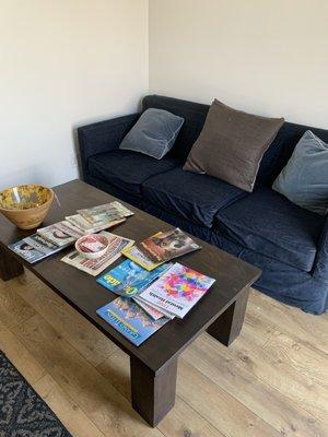 Comfortable couch to relax while your vehicle is being serviced.