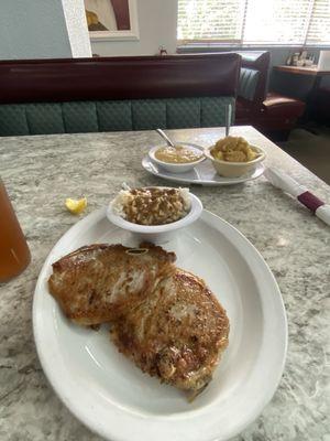 Pork chops, rice and gravy, apple sauce and banana pudding.  One of their lunch special.