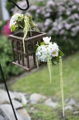 Birdcages Hanging on Shepherds Hooks