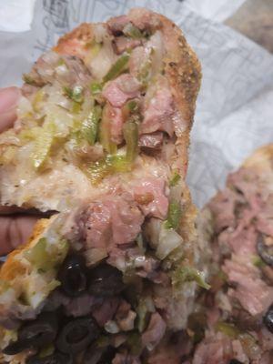 This is a philly cheesesteak sandwich I ordered.the meat is raw there  was blood on the bun.  Needless to say food and money wasted.