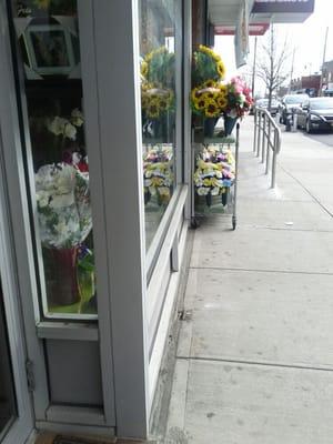 Right side of the front of the store. Flowers for Funeral plots etc.