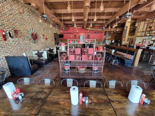 Spacious main dining room, with more seating at the bar, and a covered outdoor patio, too.