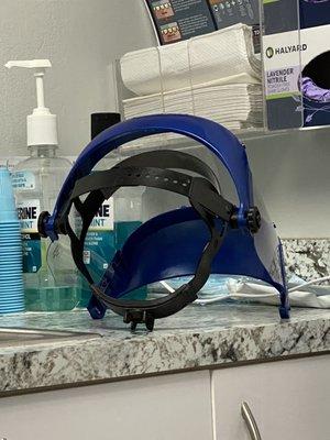 A sign of the times: face shield used by dental staff (as well as a mask)