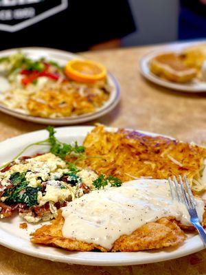 Chicken Fried Chicken with sautéed egg whites, bacon and spinach soooooo delicious!