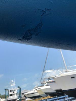 Gel Coat damage that was no there when boat delivered for painting.