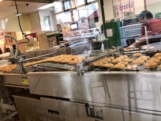 You can watch your donut being made while waiting inside