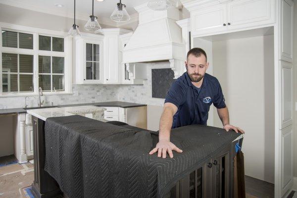 We make sure to protect all counters before beginning the installation process.