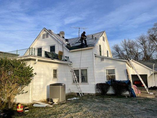 Reroof in progress.   Safety first.