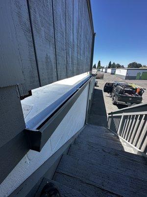 New TPO deck drain and rail