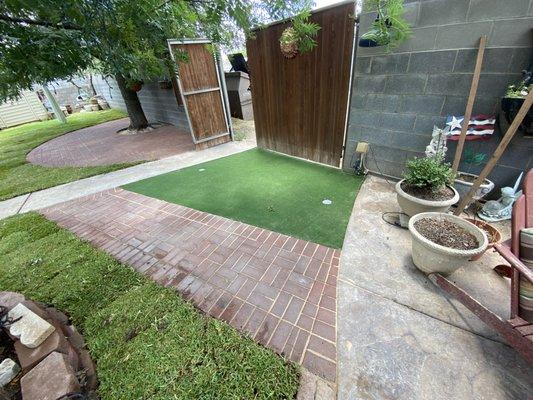 Backyard Renovation - Interlocking Pavers Walkway, Putting Green with two cups, St Augustine Natural Grass & Pavers Patio Around tree