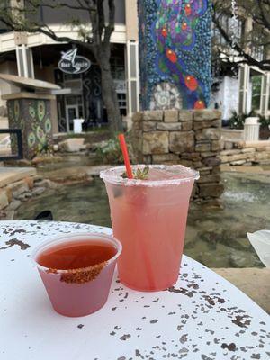 Prickly pear margarita on the rocks with sugar rim & a Mexican Candy shot