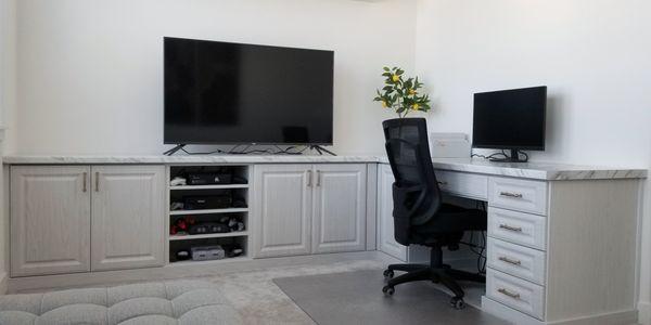 Custom entertainment center and computer desk in the loft