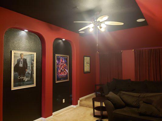 We repainted this Home theatre room with darker colors to create a more theatre fill.