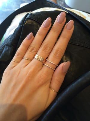 Acrylic round shape nails by Ken. Polish ladylike by Essi. Love this place!