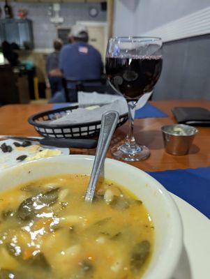 Spinach soup, a glass of red and some bread and olives. Comfort food.