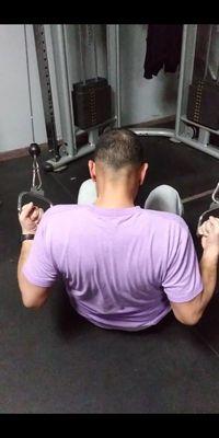 Isolated Cable Lat Pulls. Making the Latissimus muscles work in isolation for a more serious contraction.