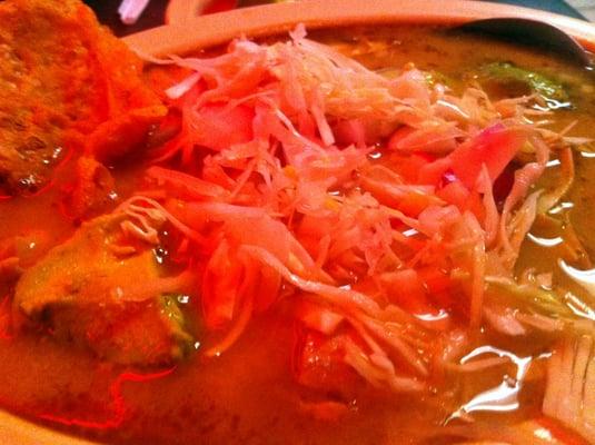 Pozole with radish, cabbage, onion, avocado, and chicharrones