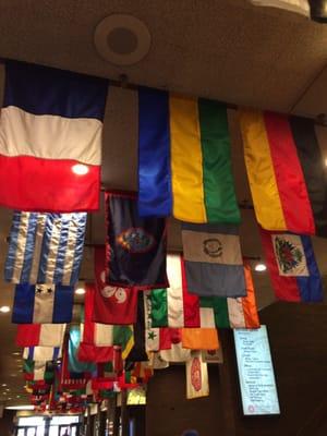 Flags line the ceiling of the student center, representing the countries of staff and students at ISU.