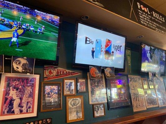 TVs mounted on the wall throughout the bar. They also play the sound for the most popular game on. Patriot's Bar, owner is from Boston!