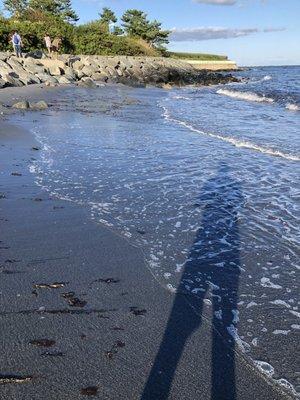 Black, soft sand