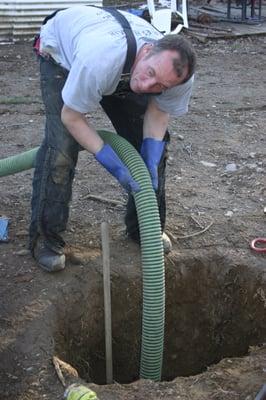 Owner - Charles Hulsair - pumping a very difficult septic tank in the Red Oaks Mills section of Dutchess County