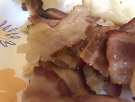 Farmers wrap with uncooked bacon and no egg