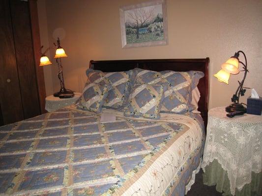 Room #1 where guests enjoy all the amenities of the hotel with easy access to the front porch