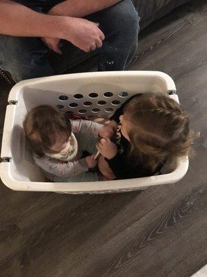 The laundry basket she used to shove things in to take photos room by room!