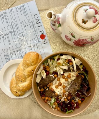 Choreg- Armenian brioche roll, 
 Warm bowl with black lentils, greens , topped with luleh kabobs- Armenian ground beef kabobs , tourshi-