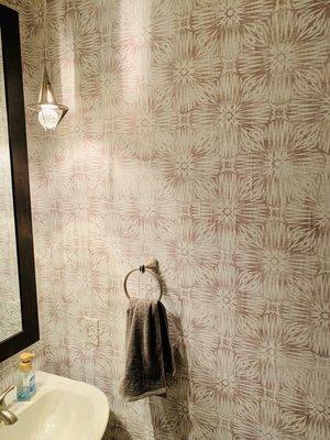 Self adhesive wall paper in guest bathroom