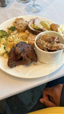 Beef petites, pork loin, potato salad, chicken, and broccoli