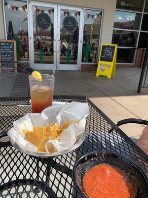 Sitting on the patio enjoying our chips and yummy salsa. Being served by our amazing new friend Leo who took great care of us!!