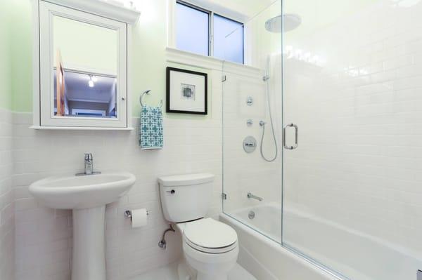 Renovated bathroom - new shower, sink, floors and tile and shower glass door and more...