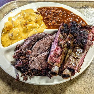 2-meat plate with cheesy potatoes and baked beans.