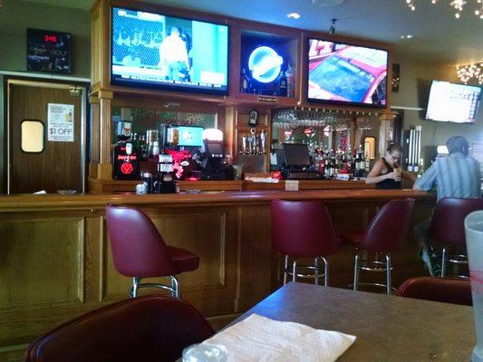 Bar area with TVs to watch the games (smoking)