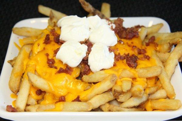 Loaded fries.  Fries with melted shredded cheese, bacon bits topped off with sour cream